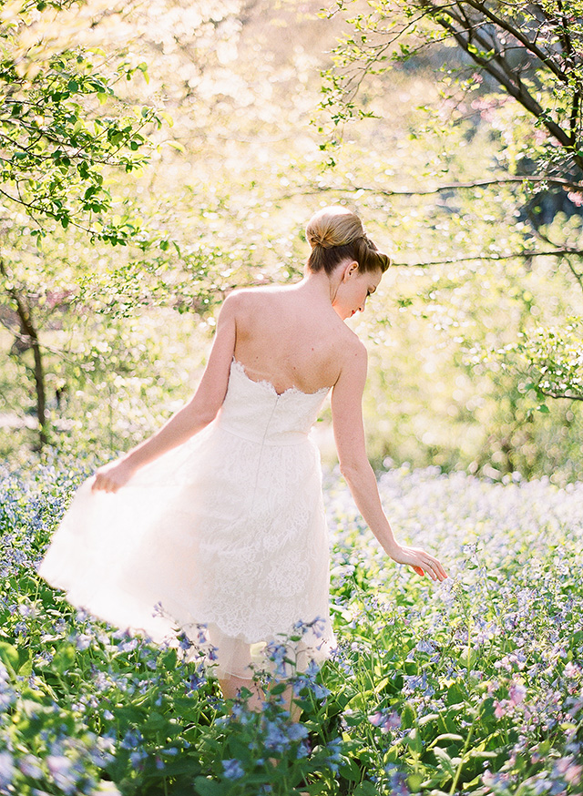 bride, short dress, a-line, bun, updo, makeup, hair, flowers, field, trees, sunshine