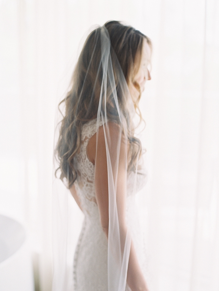 bride fully dressed for the first time with cathedral wedding veil | NYC Wedding Photographer | Beacon Roundhouse New York Wedding | photographed by Kt Crabb Photography