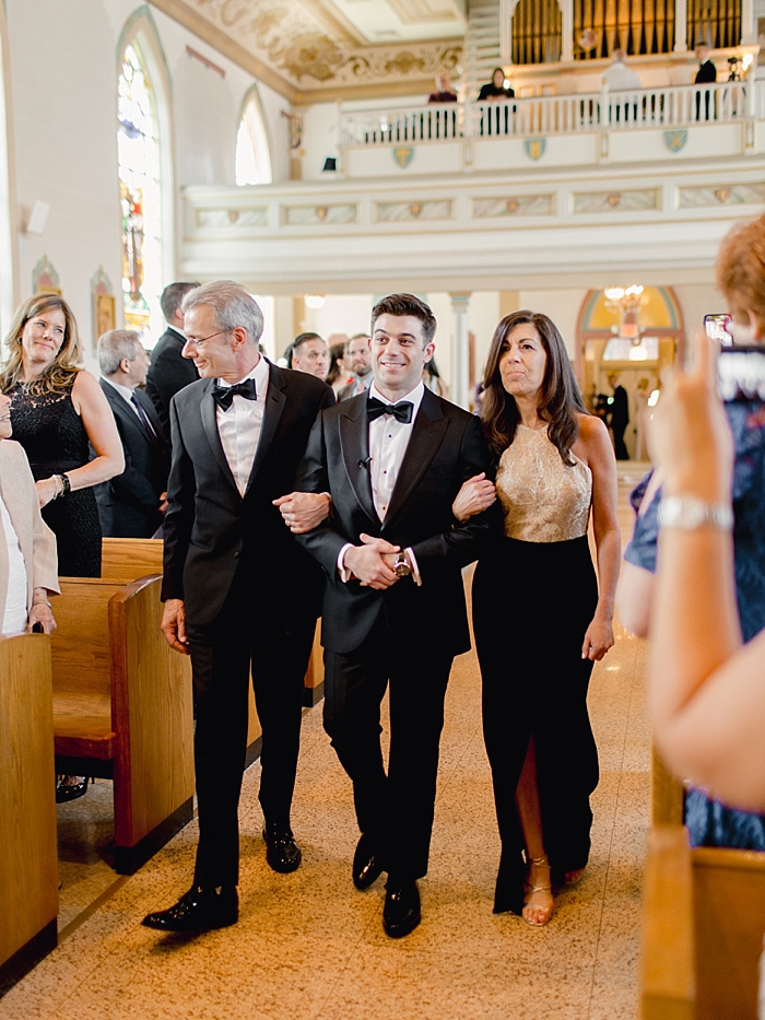 groom walks down aisle with mom and dad during wedding ceremony | NYC Wedding Photographer | Beacon Roundhouse New York Wedding | photographed by Kt Crabb Photography