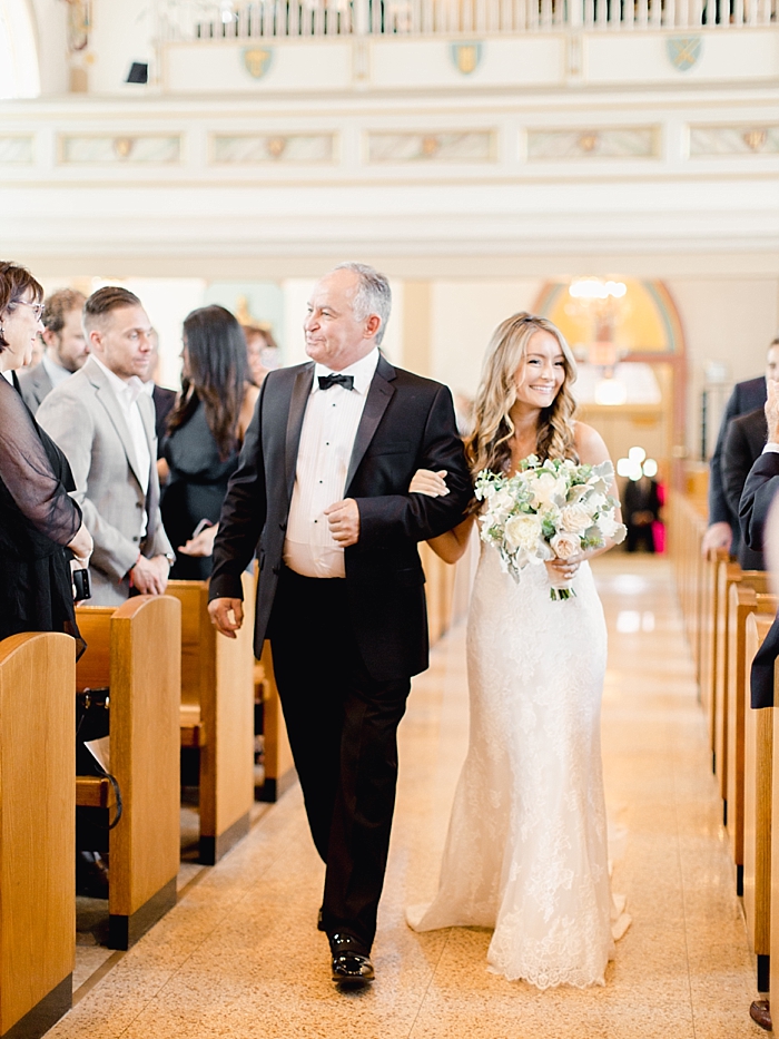 bride and dad walking down aisle towards groom during wedding ceremony | NYC Wedding Photographer | Beacon Roundhouse New York Wedding | photographed by Kt Crabb Photography