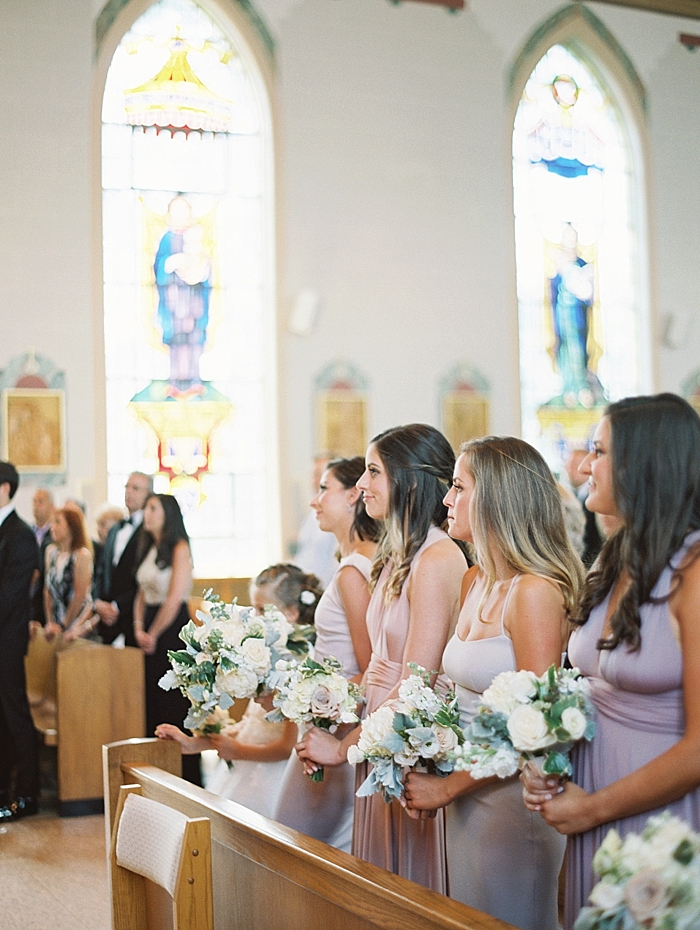 bridesmaids look on during wedding ceremony | NYC Wedding Photographer | Beacon Roundhouse New York Wedding | photographed by Kt Crabb Photography