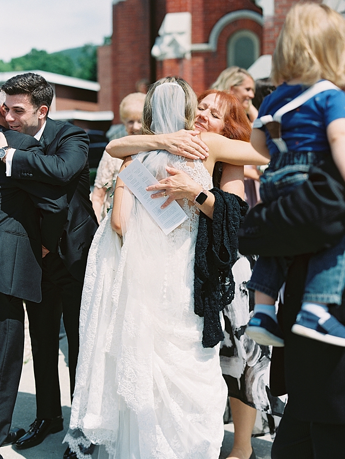 wedding guests congratulate the newly weds | NYC Wedding Photographer | Beacon Roundhouse New York Wedding | photographed by Kt Crabb Photography