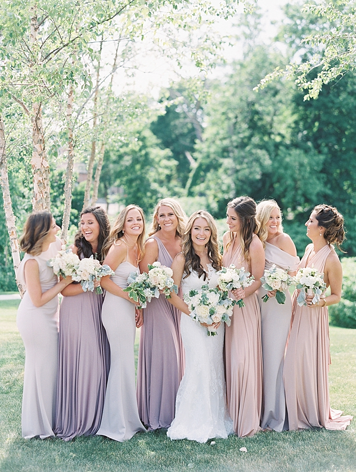 bridesmaids all laughing and smiling at one another | NYC Wedding Photographer | Beacon Roundhouse New York Wedding | photographed by Kt Crabb Photography