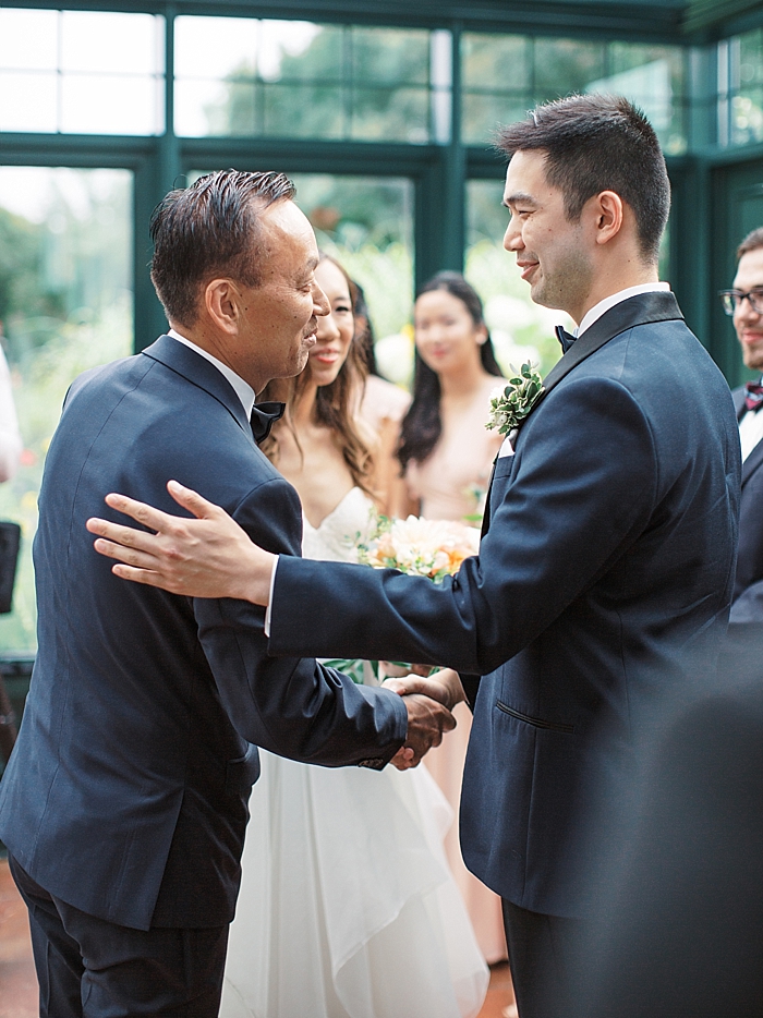 groom greeting father of the bride