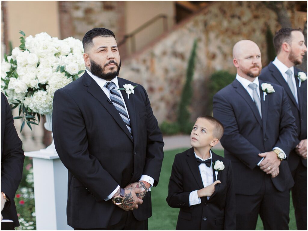 groom crying at alter during ceremony at Bella Collina Orlando Wedding