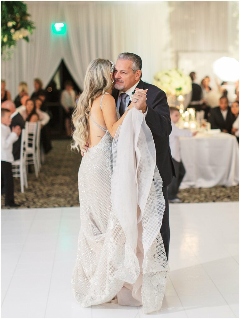 father and daughter dance with bride and father of the bride at Bella Collina Orlando Wedding