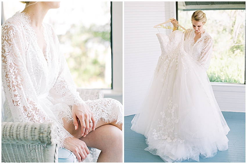 bride stands in lace robe showing off wedding gown at Bok Tower gardens wedding