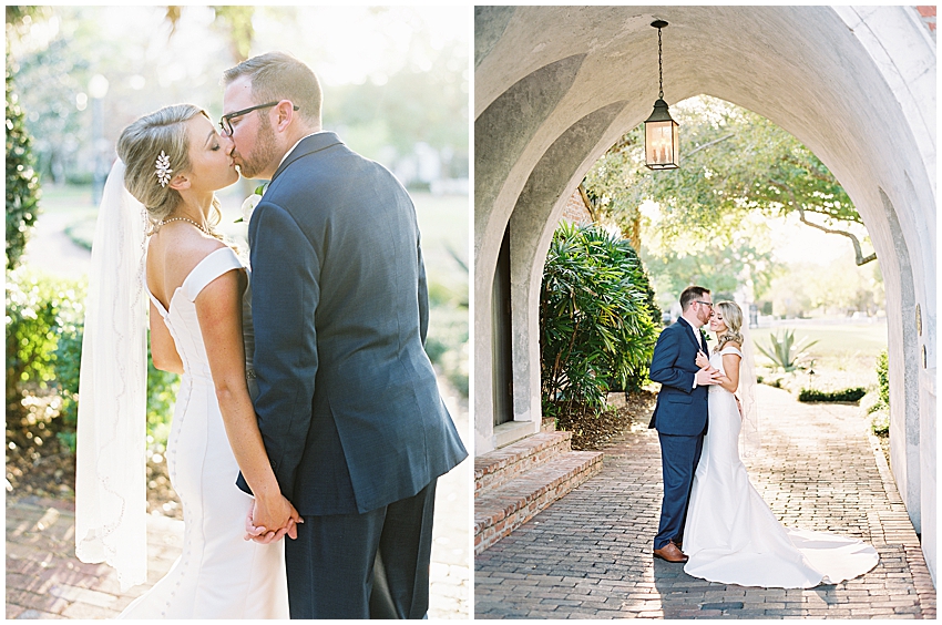 bride and groom hold hands while kissing under archway at casa Feliz in winter park Florida wedding