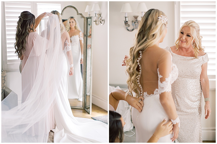 bride gets dressed with mom standing by smiling at the Addison in boca grande Miami wedding